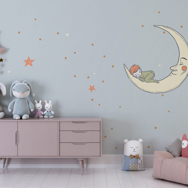 Zidni mural dječaka koji spava na Mjesecu