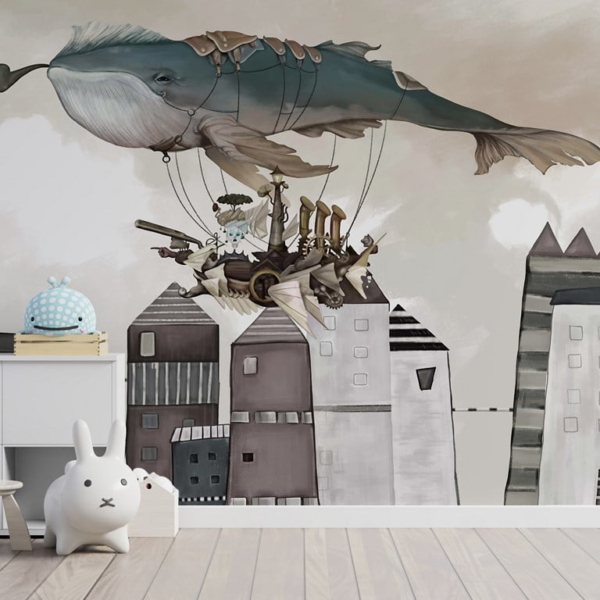 Leteći kit iznad gradskog murala za dijete