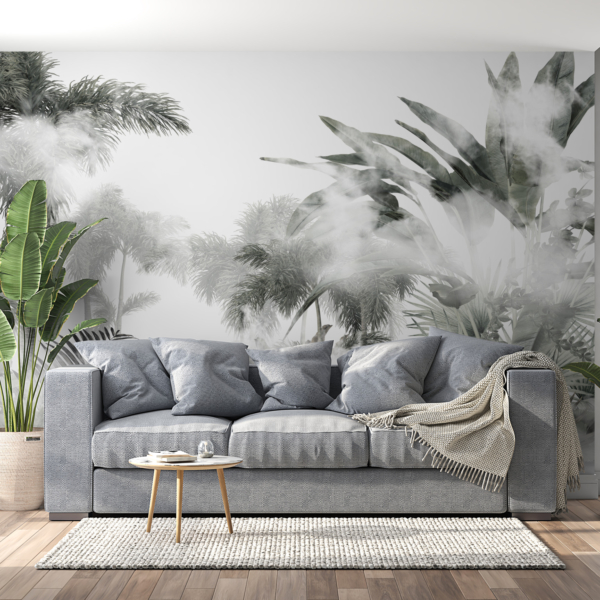 Vrhovi palmi iza zidnog murala s maglom