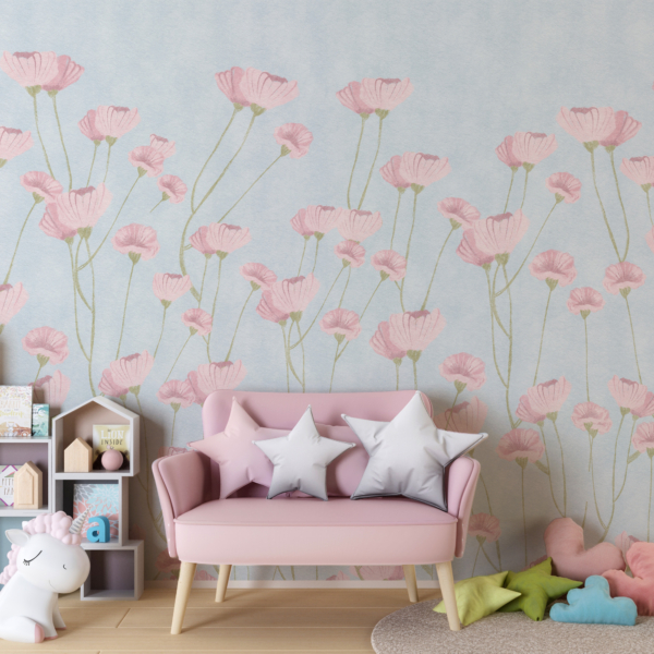 Ružičasto cvijeće na zidnom zidu plave pozadine